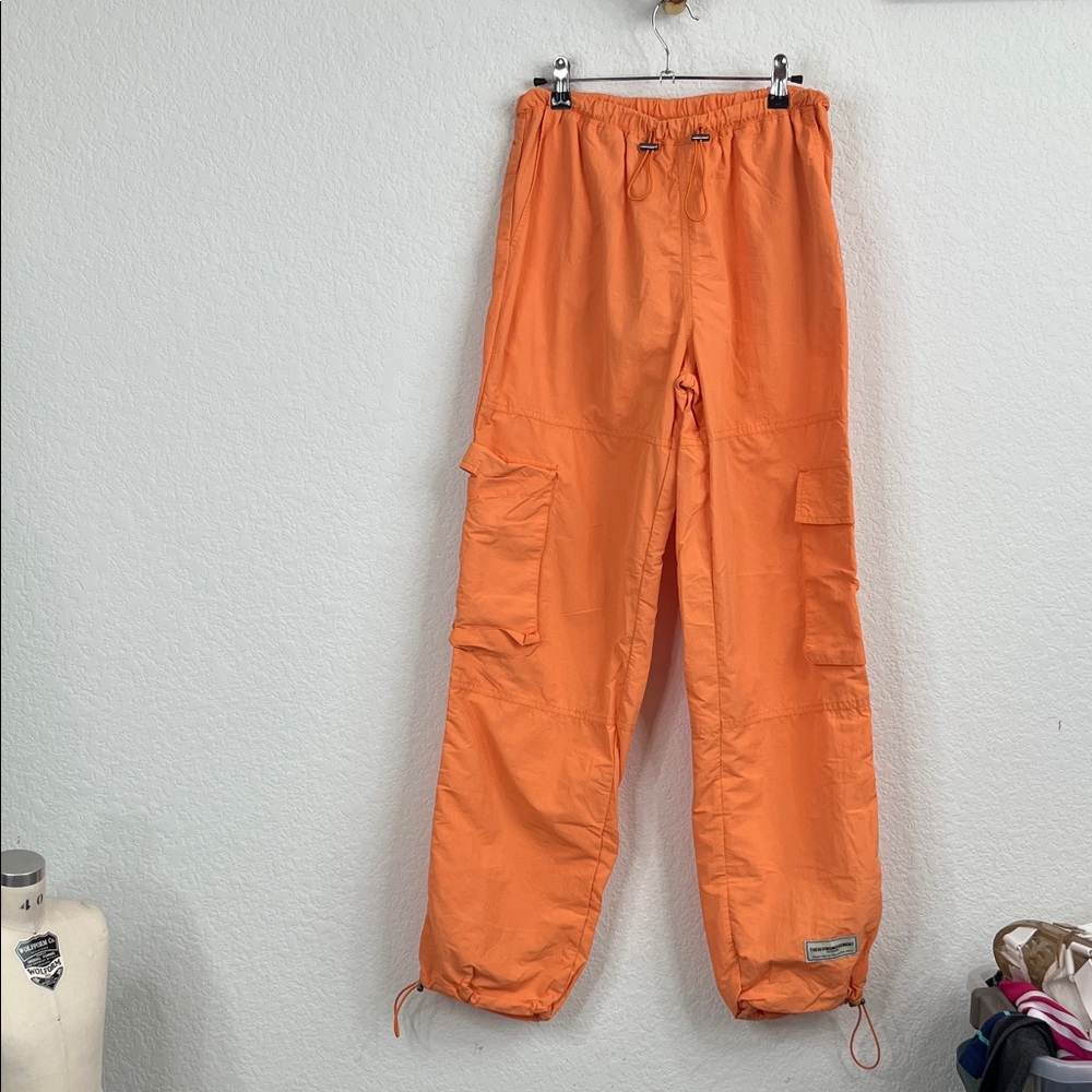 The Giving Movement Dance Orange Cargo Pants Drawcord Bungee